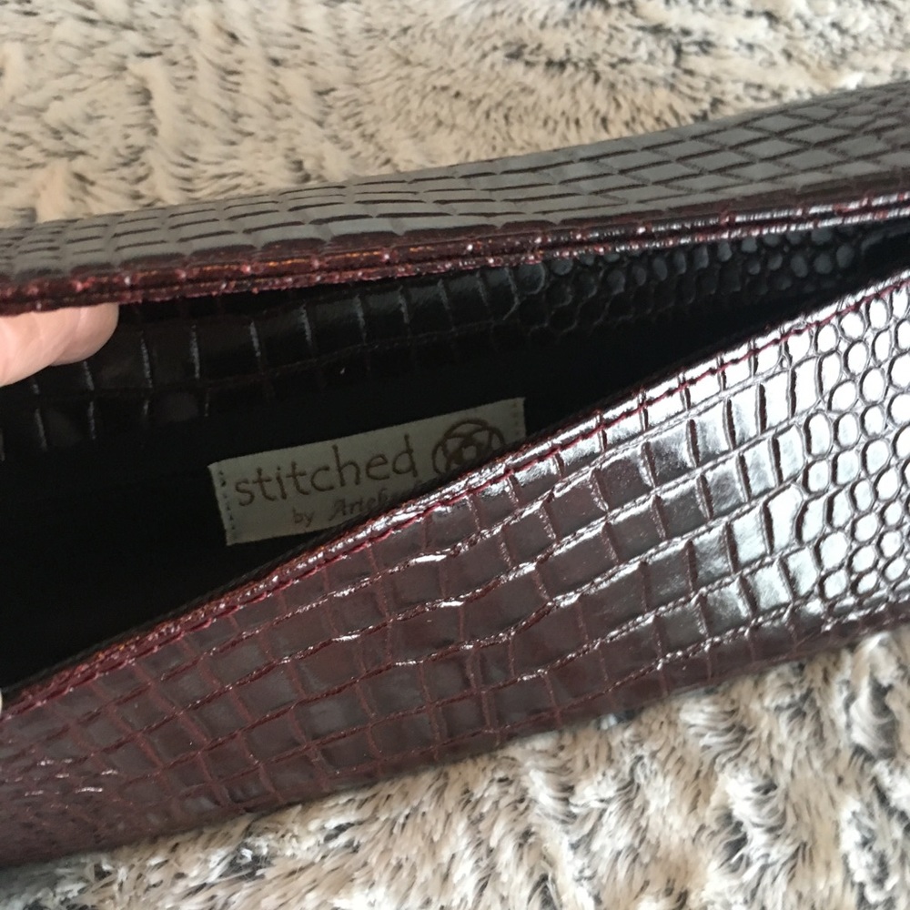 Chocolate Croc Embossed leather clutch.